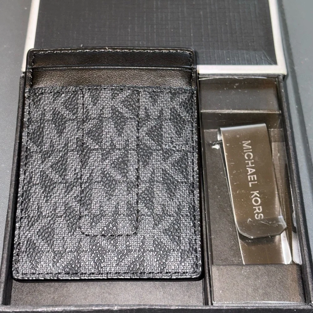 Michael Kors Black Wallet with Silver Brand Lettering with Belt Clip